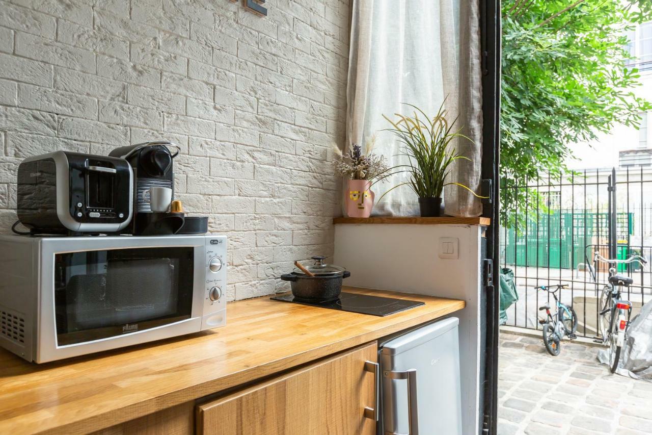 Appartamento Artisan Lofts courtyard Opéra Parigi Esterno foto